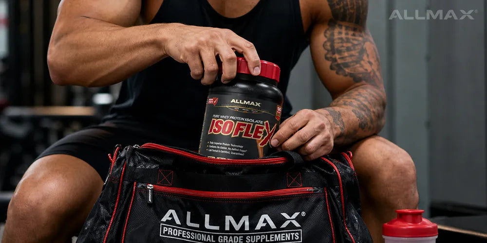 a man taking isoflex out of an allmax bag