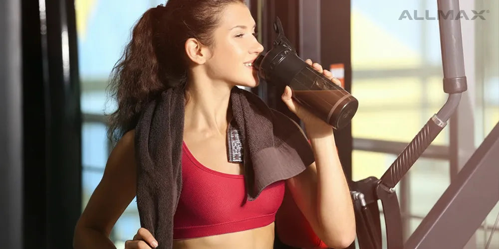 Female drinking protein shake