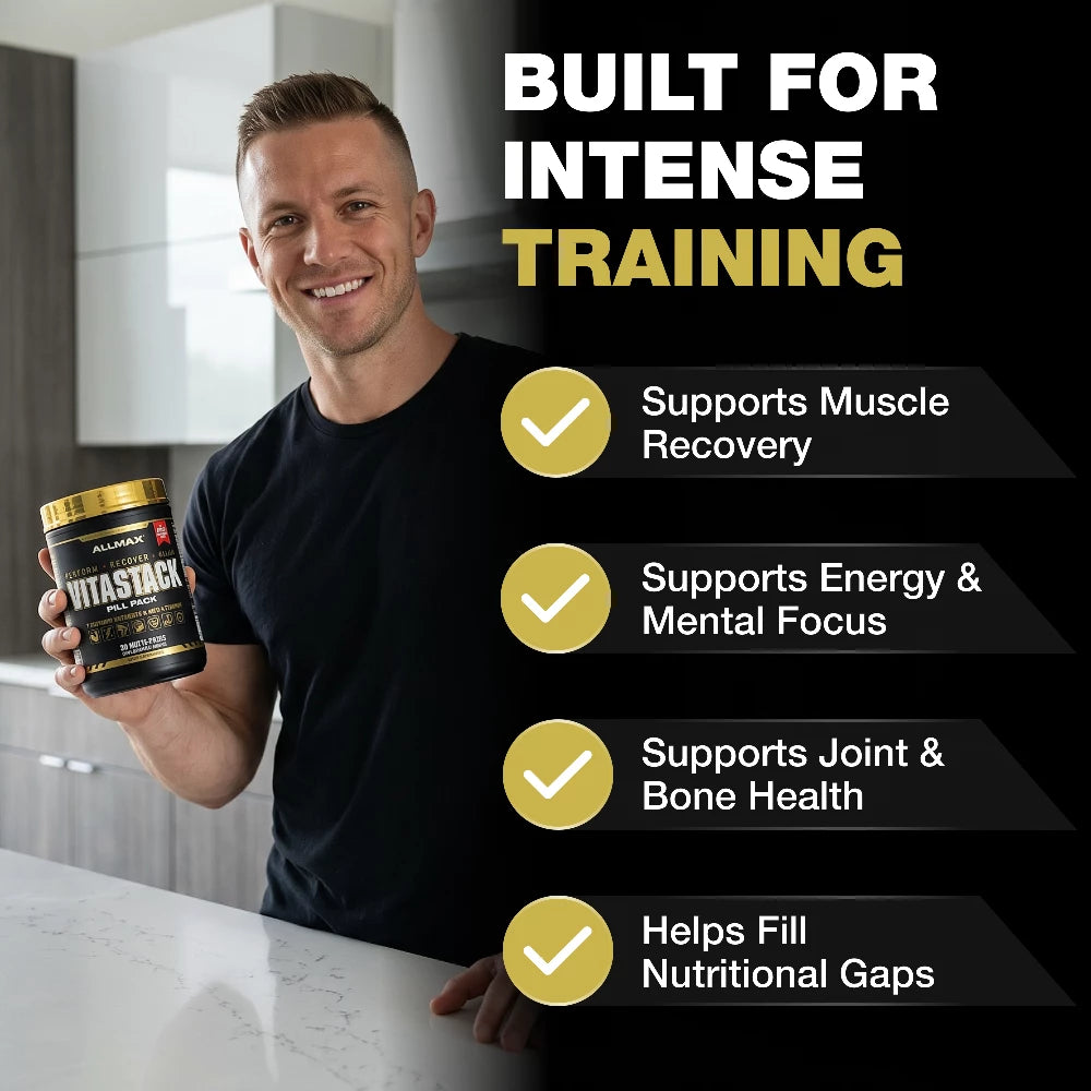 Man holding a supplement container with text about its benefits in a kitchen setting