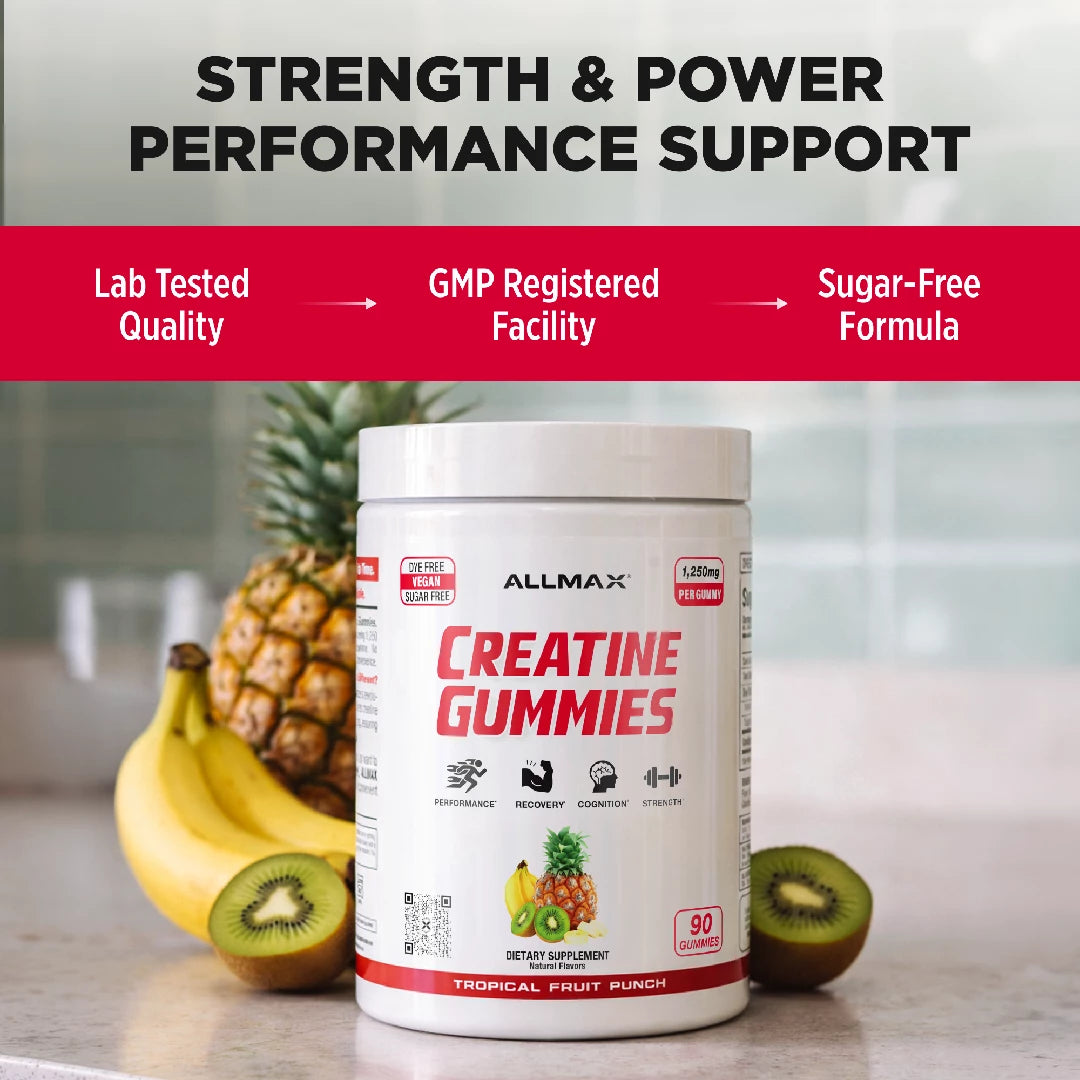 Allmax Creatine Gummies container with fruits on a blurred kitchen background
