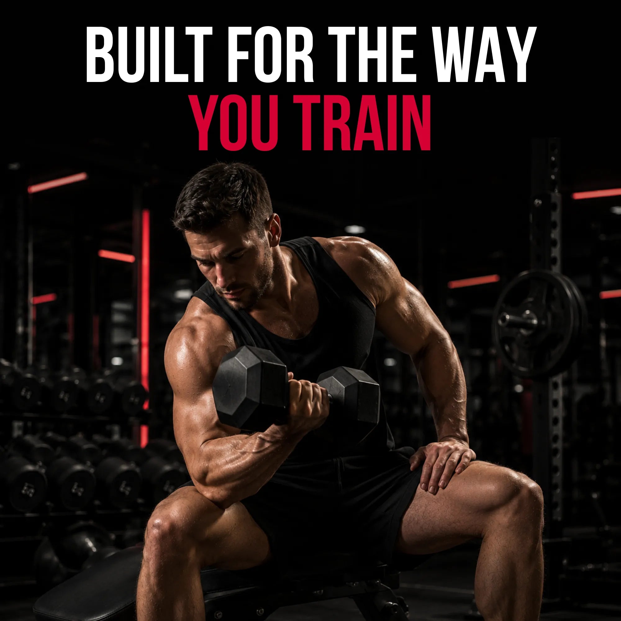 A muscular man in a gym setting, wearing a black tank top and shorts while lifting a hex dumbbell. The background is a dark gym with red accent lights and other equipment.